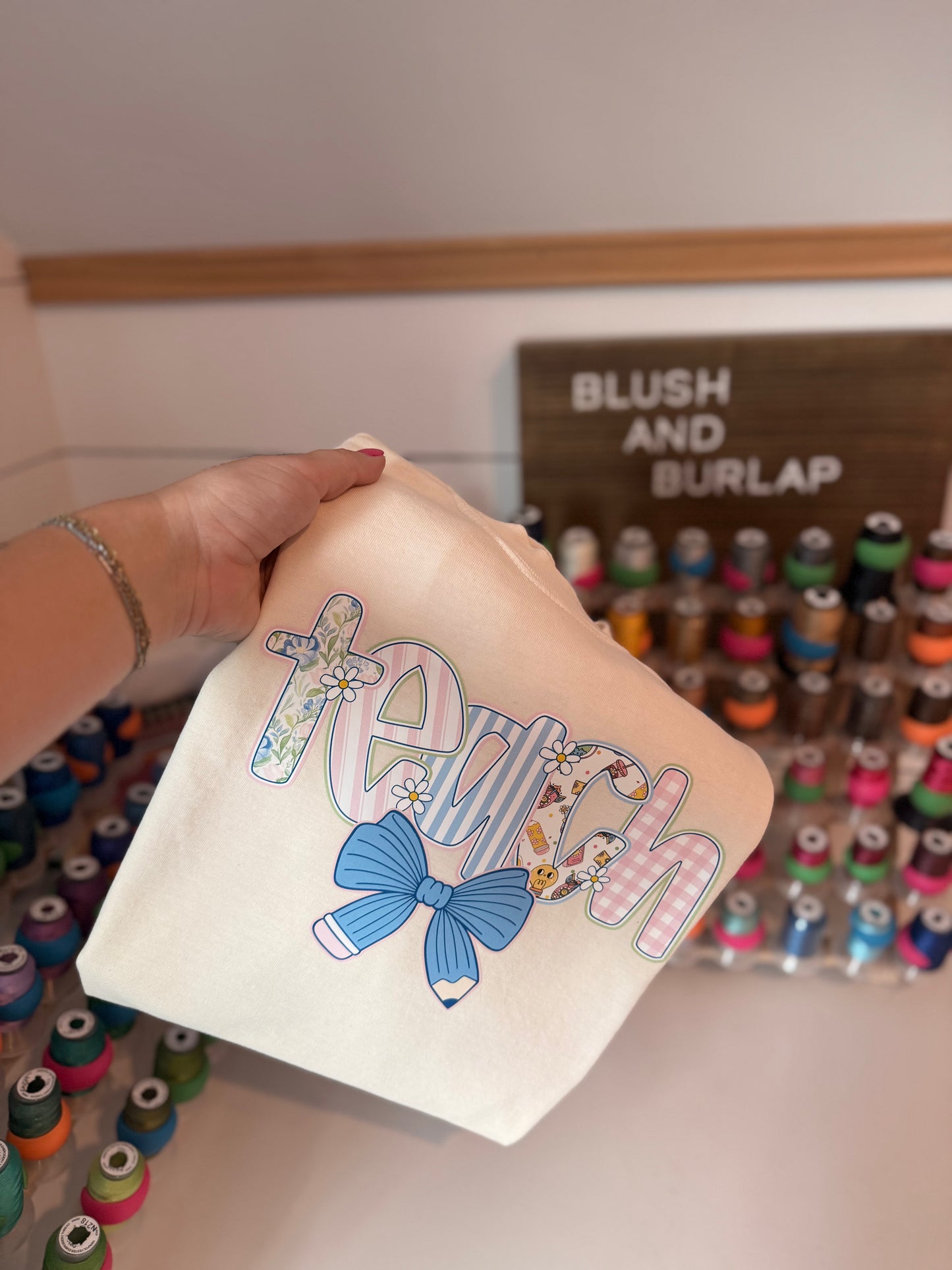 Teach (blue bow)