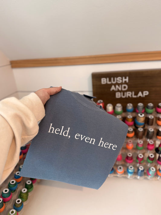 Held, Even Here