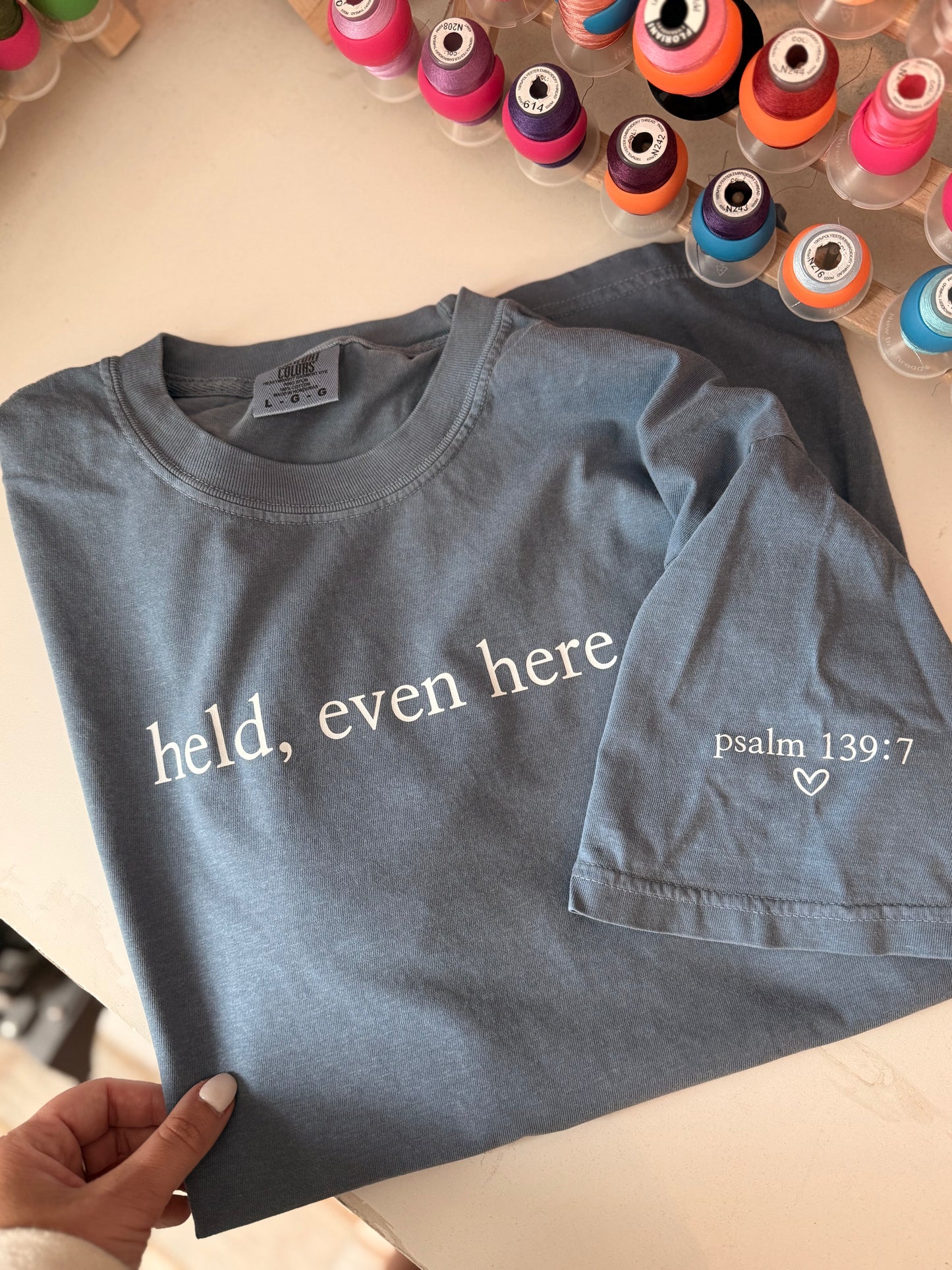 Held, Even Here